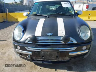 2002 MINI Hardtop with VIN WMWRC33402TC32985, listed as a IAAI auction lot 42608636 with 159,996 mi miles and . Bid and sale history available at DreamBid. Image 6.