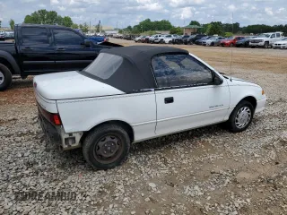 1993 Geo Metro z VIN JG1MR3362PK209644, wystawiony jako Copart lot #58749655 z przebiegiem 149 163 mil mil oraz Szkoda całkowita • Salvage title. Historia ofert i sprzedaży dostępna na DreamBid. Obrazek 3.