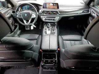 2019 BMW 7 Series 740i с VIN WBA7E2C55KB454929, выставлен на аукционе Copart как лот 49166235 с пробегом 57 051 миль миль и Списание • Salvage title. История ставок и продаж доступна на DreamBid. Изображение 8.
