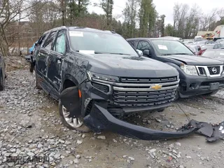 2023 Chevrolet Suburban Premier with VIN 1GNSCFKD1PR364024, listed as a IAAI auction lot 41222865 with 61,355 mi miles. Bid and sale history available at carsss.com. Image 1.