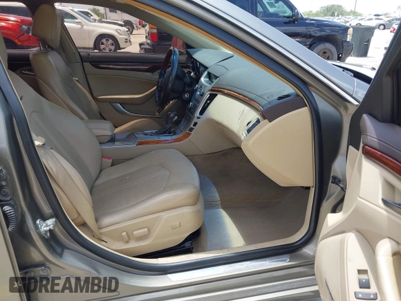2010 Cadillac CTS Luxury with VIN 1G6DG5EG6A0148433, listed as a IAAI auction lot 42686517 with 106,701 mi miles and . Bid and sale history available at DreamBid. Image 5.