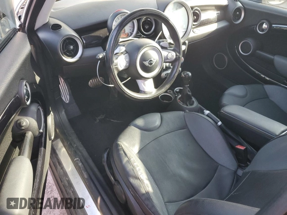 2009 MINI Hardtop S with VIN WMWMF73529TW82713, listed as a Copart auction lot 51152035 with 170,954 mi miles and Salvage title. Bid and sale history available at DreamBid. Image 8.