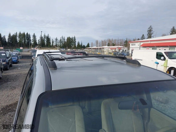 2003 Mazda MPV LX with VIN JM3LW28A730338415, listed as a IAAI auction lot 41741593 with 206,877 mi miles. Bid and sale history available at carsss.com. Image 17.