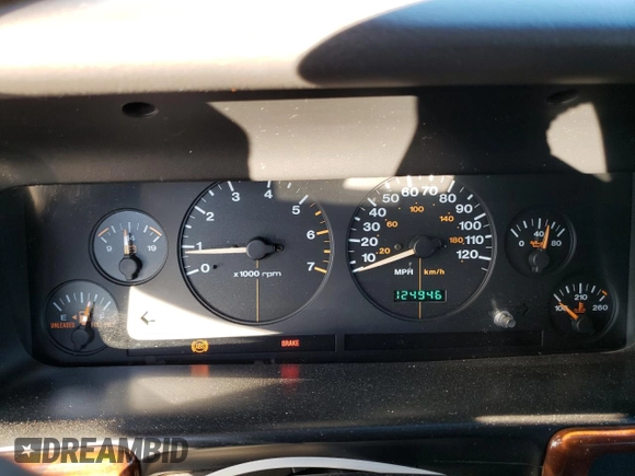 1997 Jeep Grand Cherokee Laredo with VIN 1J4GZ58Y6VC647434, listed as a Copart auction lot 73496824 with 124,946 mi miles and Salvage Title. Bid and sale history available at carsss.com. Image 9.