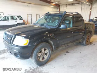 2005 Ford Explorer Sport Trac XLS with VIN 1FMZU77K45UB32573, listed as a IAAI auction lot 41760637 with 216,186 mi miles. Bid and sale history available at carsss.com. Image 2.