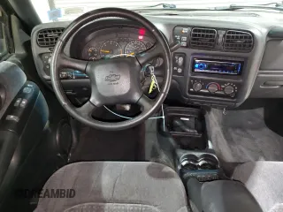 2000 Chevrolet Blazer LS z VIN 1GNCT18W9YK188091, wystawiony jako Copart lot #78592844 z przebiegiem 69 497 mil mil oraz Szkoda całkowita • Salvage title. Historia ofert i sprzedaży dostępna na DreamBid. Obrazek 8.