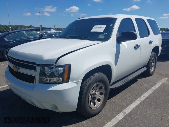 2013 Chevrolet Tahoe Commercial z VIN 1GNSK2E01DR268491, wystawiony jako IAAI lot #40302113 z przebiegiem 183 889 mil mil oraz . Historia ofert i sprzedaży dostępna na DreamBid. Obrazek 2.