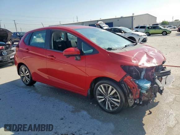 2015 Honda Fit EX-L with VIN 3HGGK5H87FM701089, listed as a Copart auction lot 54057335 with 88,423 mi miles and Salvage title. Bid and sale history available at DreamBid. Image 4.
