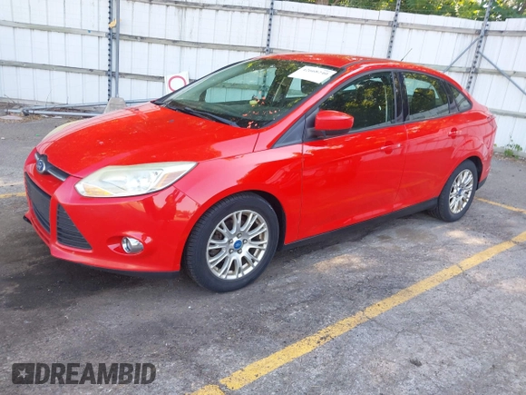 2012 Ford Focus SE with VIN 1FAHP3F24CL239326, listed as a IAAI auction lot 42668240 with 140,268 mi miles and . Bid and sale history available at DreamBid. Image 2.