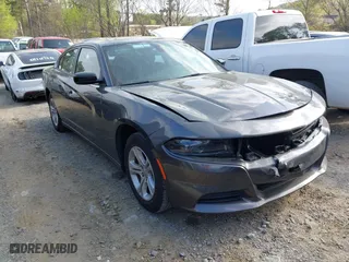 2023 Dodge Charger SXT with VIN 2C3CDXBG2PH571536, listed as a IAAI auction lot 41940969 with 51,079 mi miles. Bid and sale history available at carsss.com. Image 1.