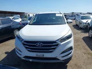 2017 Hyundai Tucson Value with VIN KM8J33A27HU438902, listed as a IAAI auction lot 41835502 with 84,885 mi miles. Bid and sale history available at carsss.com. Image 12.