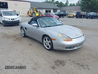 2001 Porsche Boxster with VIN WP0CA29801U622574, listed as a IAAI auction lot 42634425 with 123,881 mi miles and . Bid and sale history available at DreamBid. Image 1.