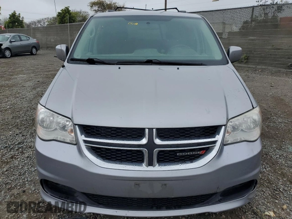 2016 Dodge Grand Caravan SXT with VIN 2C4RDGCG8GR312046, listed as a Copart auction lot 51334455 with 180,072 mi miles and Salvage Title. Bid and sale history available at DreamBid. Image 5.