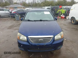 2009 Kia Spectra LX z VIN KNAFE221X95619246, wystawiony jako IAAI lot #41739339 z przebiegiem Nie podano mil oraz . Historia ofert i sprzedaży dostępna na DreamBid. Obrazek 12.