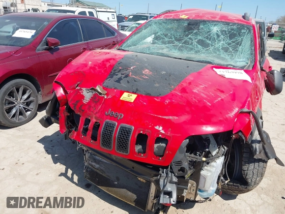 2019 Jeep Cherokee Trailhawk Elite with VIN 1C4PJMBX8KD305108, listed as a IAAI auction lot 41763970 with 70,705 mi miles. Bid and sale history available at carsss.com. Image 6.