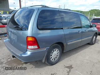 1999 Ford Windstar SE with VIN 2FMZA5240XBC66771, listed as a IAAI auction lot 42208716 with 143,764 mi miles and . Bid and sale history available at carsss.com. Image 4.