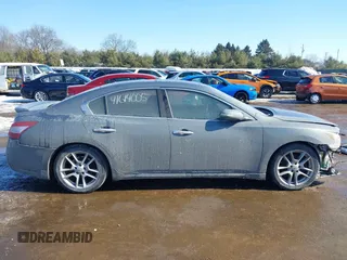 2010 Nissan Maxima S z VIN 1N4AA5AP9AC803681, wystawiony jako IAAI lot #41614005 z przebiegiem 195 485 mil mil oraz . Historia ofert i sprzedaży dostępna na DreamBid. Obrazek 14.