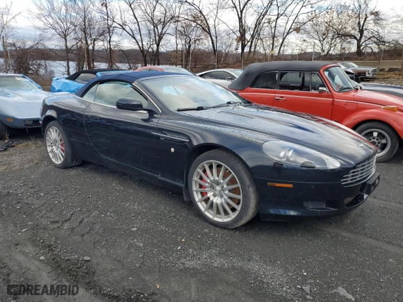 2009 Aston Martin DB9 with VIN SCFAD02E79GB10991, listed as a Copart auction lot 85487894 with 0 mi miles and Salvage Title. Bid and sale history available at carsss.com. Image 4.