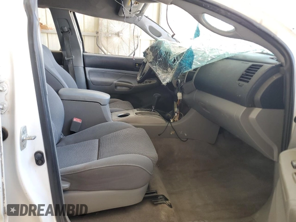 2005 Toyota Tacoma with VIN 3TMMU52N65M001833, listed as a Copart auction lot 62111395 with Not provided miles and Salvage title. Bid and sale history available at DreamBid. Image 7.
