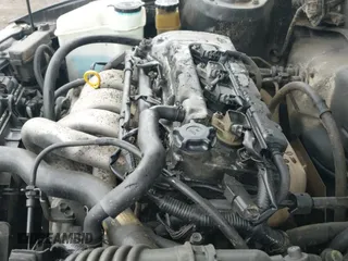 2002 Toyota Corolla CE z VIN 2T1BR12E72C581261, wystawiony jako IAAI lot #43320330 z przebiegiem 190 370 mil mil oraz . Historia ofert i sprzedaży dostępna na DreamBid. Obrazek 12.