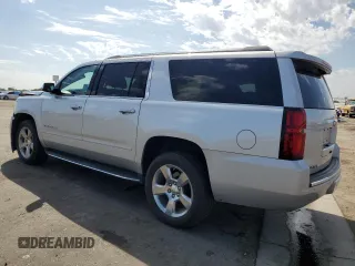 2020 Chevrolet Suburban Premier with VIN 1GNSCJKC0LR216855, listed as a Copart auction lot 72287114 with 94,642 mi miles and Salvage title. Bid and sale history available at DreamBid. Image 2.