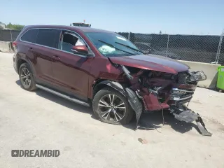 2019 Toyota Highlander LE z VIN 5TDZARFH1KS045731, wystawiony jako Copart lot #57271745 z przebiegiem 83 126 mil mil oraz Czysty tytuł • Clean title. Historia ofert i sprzedaży dostępna na DreamBid. Obrazek 4.