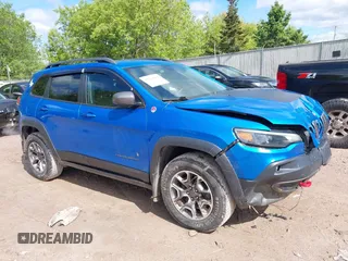 2020 Jeep Cherokee Trailhawk with VIN 1C4PJMBXXLD636547, listed as a IAAI auction lot 42314654 with 59,061 mi miles and . Bid and sale history available at DreamBid. Image 1.