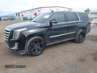 2017 Cadillac Escalade Premium Luxury z VIN 1GYS4CKJ0HR271498, wystawiony jako IAAI lot #42349511 z przebiegiem 52 338 mil mil oraz . Historia ofert i sprzedaży dostępna na DreamBid. Obrazek 2.