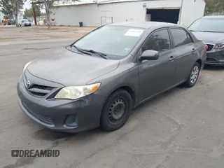 2011 Toyota Corolla L with VIN JTDBU4EE7BJ106810, listed as a IAAI auction lot 42054750 with 256,064 mi miles. Bid and sale history available at carsss.com. Image 2.