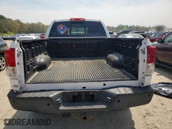 2010 Toyota Tundra 4WD Truck with VIN 5TFUY5F1XAX123787, listed as a Copart auction lot 54447555 with 242,821 mi miles and Clean Title. Bid and sale history available at carsss.com. Image 6.