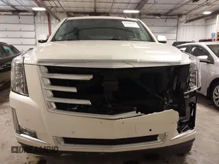 2015 Cadillac Escalade Premium z VIN 1GYS4CKJ8FR208128, wystawiony jako IAAI lot #41908785 z przebiegiem 164 598 mil mil oraz . Historia ofert i sprzedaży dostępna na DreamBid. Obrazek 12.
