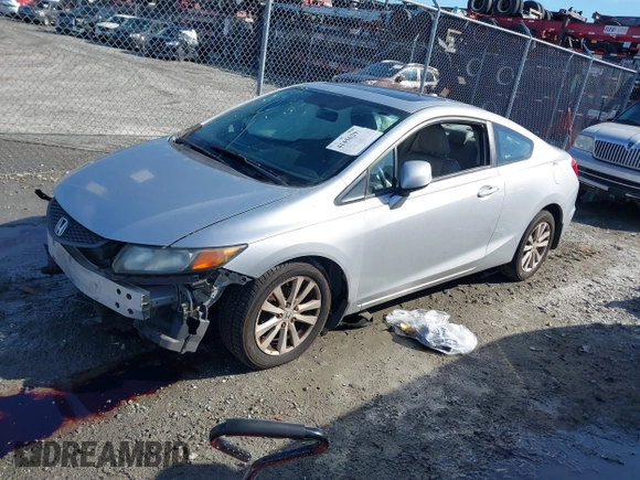 2012 Honda Civic Cpe EX-L with VIN 2HGFG3B17CH509114, listed as a IAAI auction lot 41456297 with 79,039 mi miles. Bid and sale history available at carsss.com. Image 2.