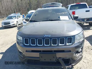 2018 Jeep Compass Altitude with VIN 3C4NJDBB2JT230751, listed as a IAAI auction lot 41671850 with 253,221 mi miles and . Bid and sale history available at carsss.com. Image 12.