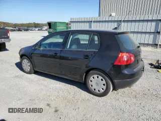 2009 Volkswagen Rabbit S with VIN WVWDA71K59W147903, listed as a Copart auction lot 76706654 with 73,297 mi miles and Salvage title. Bid and sale history available at DreamBid. Image 2.