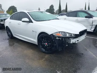 2015 Jaguar XF V6 Portfolio with VIN SAJWA0F70F8U62534, listed as a IAAI auction lot 41521097 with NaN miles. Bid and sale history available at carsss.com. Image 1.