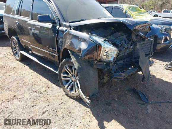 2018 GMC Yukon Denali with VIN 1GKS2CKJ6JR303263, listed as a IAAI auction lot 41633514 with 130,990 mi miles. Bid and sale history available at carsss.com. Image 1.