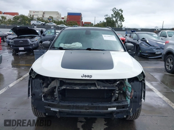 2018 Jeep Compass Trailhawk with VIN 3C4NJDDB0JT306898, listed as a IAAI auction lot 41798954 with 75,852 mi miles and . Bid and sale history available at carsss.com. Image 6.