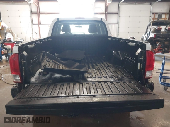 2016 Toyota Tacoma SR z VIN 5TFSX5ENXGX042148, wystawiony jako IAAI lot #41592688 z przebiegiem 126 528 mil mil oraz . Historia ofert i sprzedaży dostępna na DreamBid. Obrazek 16.