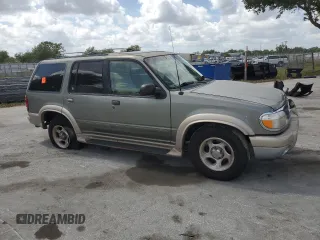 2000 Ford Explorer Eddie Bauer with VIN 1FMZU64E8YZB16294, listed as a Copart auction lot 52494655 with 196,168 mi miles and Salvage title. Bid and sale history available at DreamBid. Image 4.