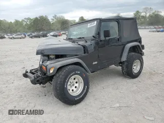 2000 Jeep Wrangler Sport z VIN 1J4FA49S9YP743515, wystawiony jako Copart lot #53906305 z przebiegiem 247 349 mil mil oraz Szkoda całkowita • Salvage title. Historia ofert i sprzedaży dostępna na DreamBid. Obrazek 1.