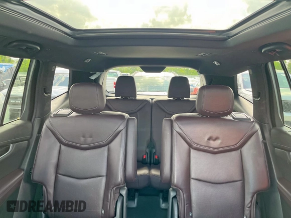 2020 Cadillac XT6 FWD Premium Luxury с VIN 1GYKPCRSXLZ104502, выставлен на аукционе Copart как лот 58211275 с пробегом 97 053 миль миль и Списание • Salvage title. История ставок и продаж доступна на DreamBid. Изображение 10.