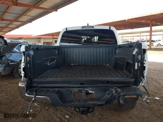 2023 Toyota Tacoma 4WD SR with VIN 3TMCZ5AN8PM650793, listed as a IAAI auction lot 41664712 with 9,427 mi miles. Bid and sale history available at carsss.com. Image 6.
