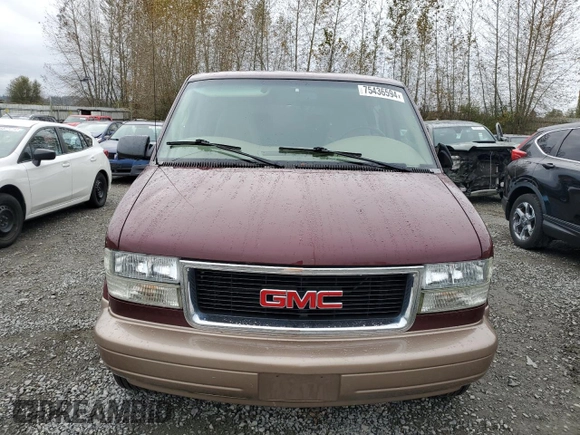 2003 GMC Safari z VIN 1GKEL19X63B510272, wystawiony jako Copart lot #75436594 z przebiegiem 31 989 mil mil oraz Szkody całkowita. Historia ofert i sprzedaży dostępna na DreamBid. Obrazek 5.