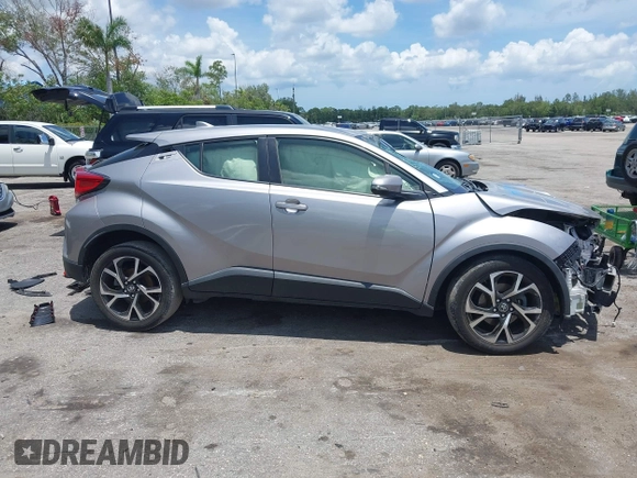 2018 Toyota C-HR XLE with VIN JTNKHMBX7J1009692, listed as a IAAI auction lot 42390685 with 77,866 mi miles and . Bid and sale history available at DreamBid. Image 14.