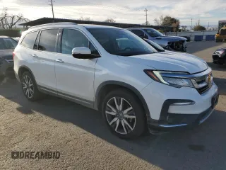 2020 Honda Pilot Touring 7-Passenger z VIN 5FNYF6H68LB002405, wystawiony jako Copart lot #46857625 z przebiegiem 69 617 mil mil oraz Szkoda całkowita • Salvage title. Historia ofert i sprzedaży dostępna na DreamBid. Obrazek 4.