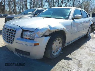 2006 Chrysler 300 Touring with VIN 2C3KA53G96H109576, listed as a IAAI auction lot 41837473 with 149,438 mi miles. Bid and sale history available at carsss.com. Image 6.