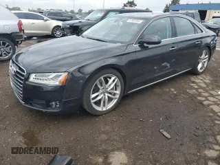 2015 Audi A8 4.0T with VIN WAUJ2AFD3FN010786, listed as a Copart auction lot 67963494 with 104,738 mi miles and Salvage title. Bid and sale history available at DreamBid. Image 1.