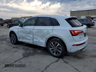 2023 Audi Q5 S line Premium Plus z VIN WA1EAAFY4P2035574, wystawiony jako Copart lot #55351055 z przebiegiem 19 777 mil mil oraz Szkoda całkowita • Salvage title. Historia ofert i sprzedaży dostępna na DreamBid. Obrazek 2.