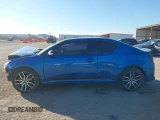 2014 Scion tC with VIN JTKJF5C78E3079618, listed as a IAAI auction lot 41107330 with 112,105 mi miles. Bid and sale history available at carsss.com. Image 15.