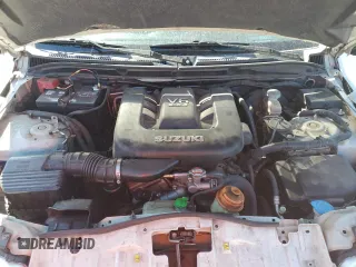 2007 Suzuki Grand Vitara XSport z VIN JS3TE944174202883, wystawiony jako Copart lot #49350025 z przebiegiem 150 692 mil mil oraz Szkoda całkowita • Salvage title. Historia ofert i sprzedaży dostępna na DreamBid. Obrazek 12.
